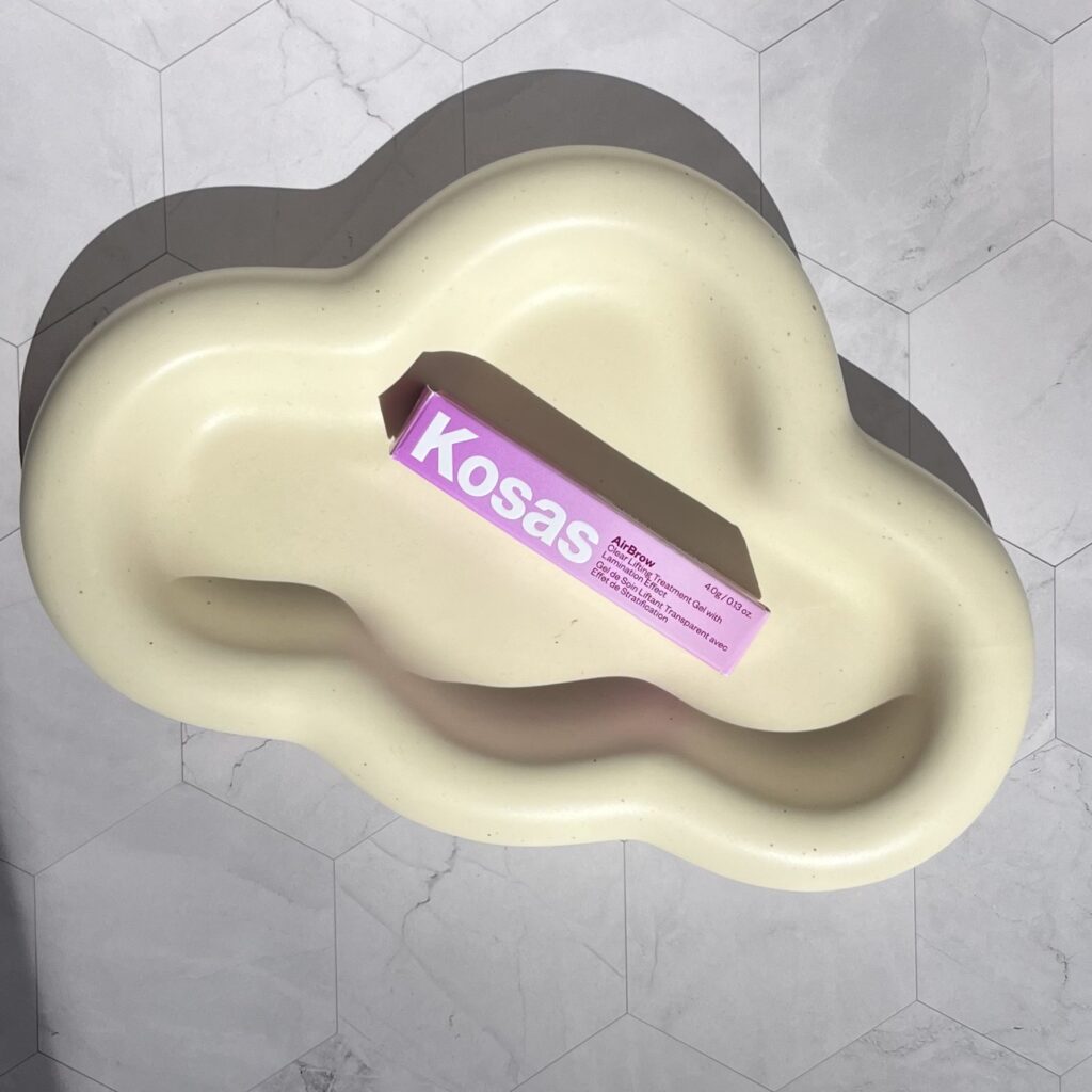 Kosas brow gel on a cloud dish
